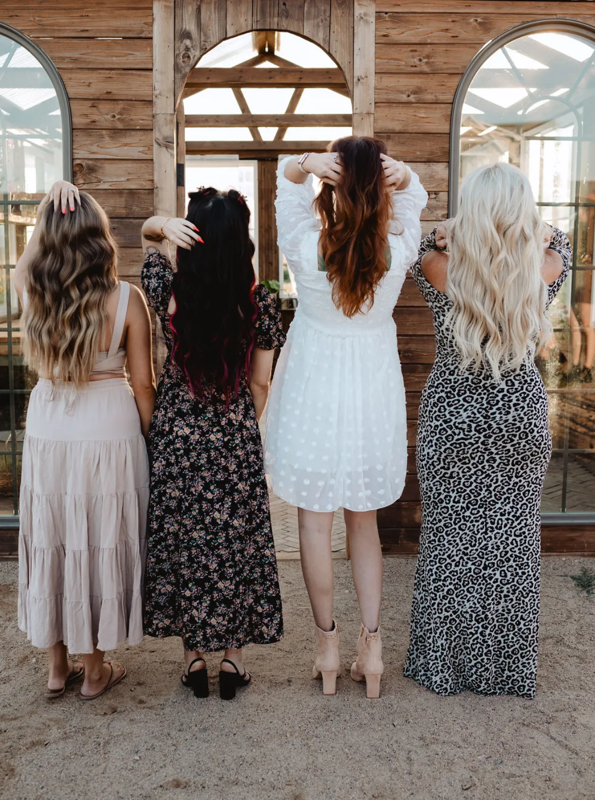 Four finished styles shown from behind at the brand shoot