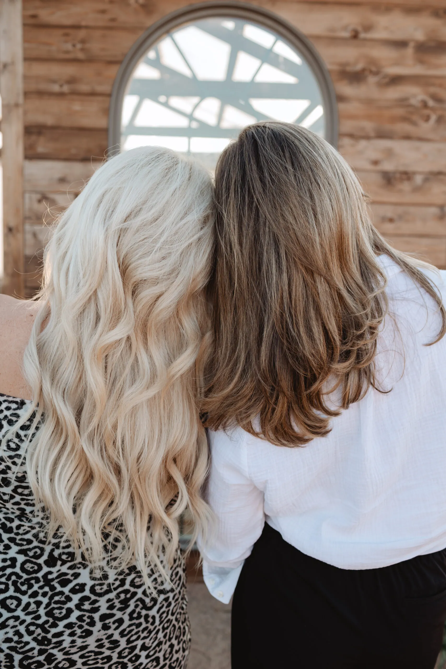 Platinum blonde and bronde hair-color results seen from behind