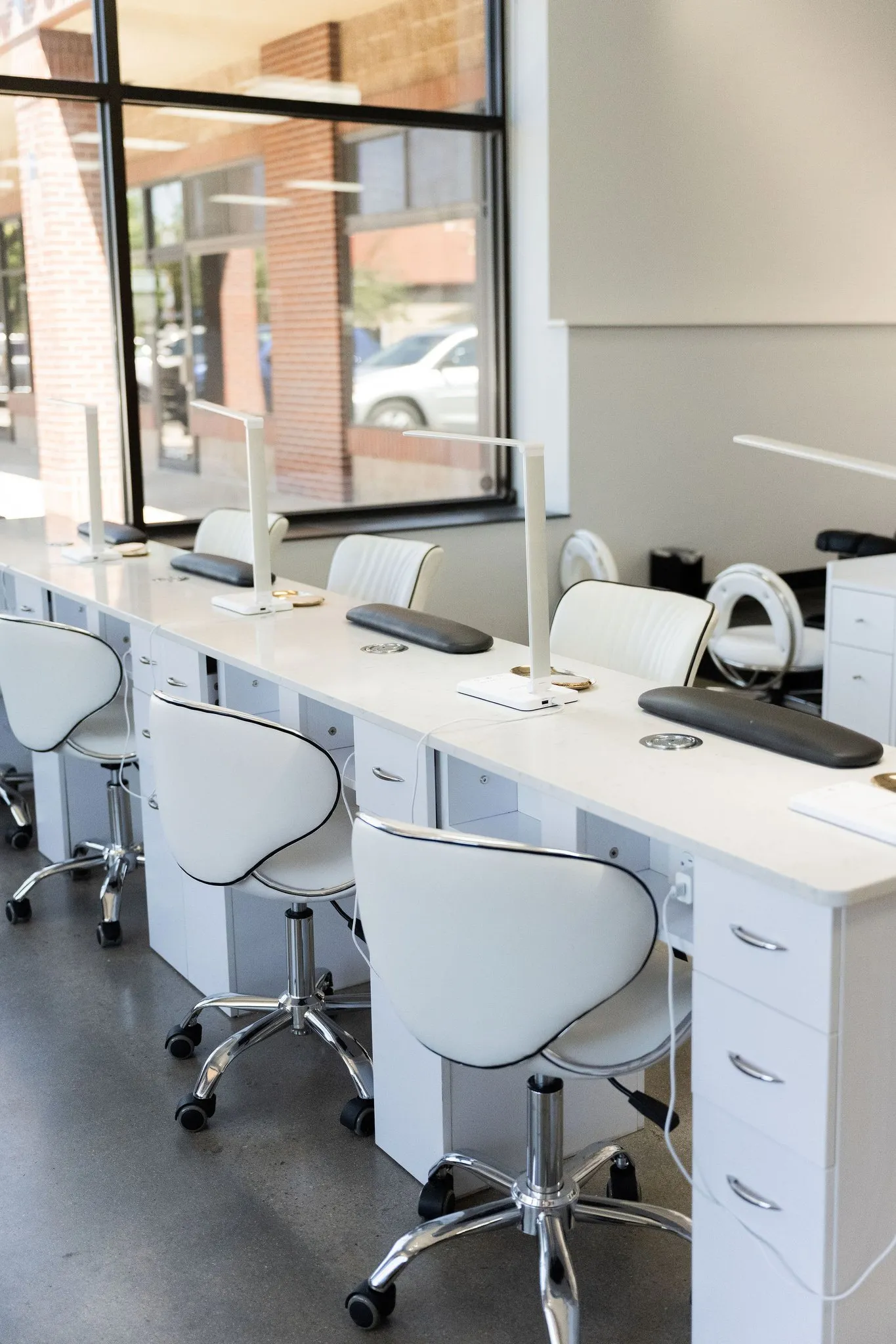 The manicure stations on the Elevate student salon floor